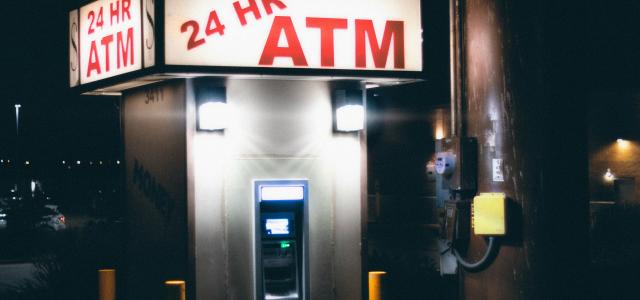 gray and black atm machine by José Reyes courtesy of Unsplash.